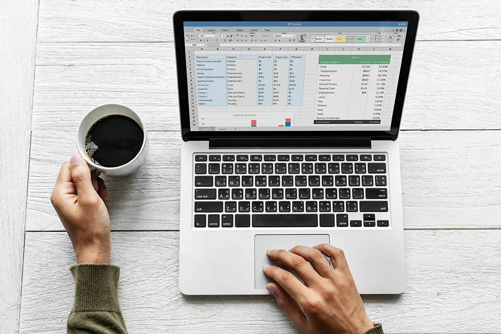 Person working on laptop with SEO tools displayed on screen